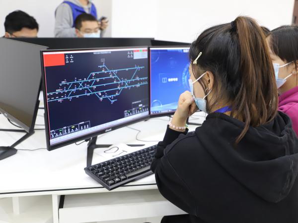 【华龙网】重庆运输职院闯进2022年金砖国家职业技能大赛工业数字孪生赛项全国决赛
